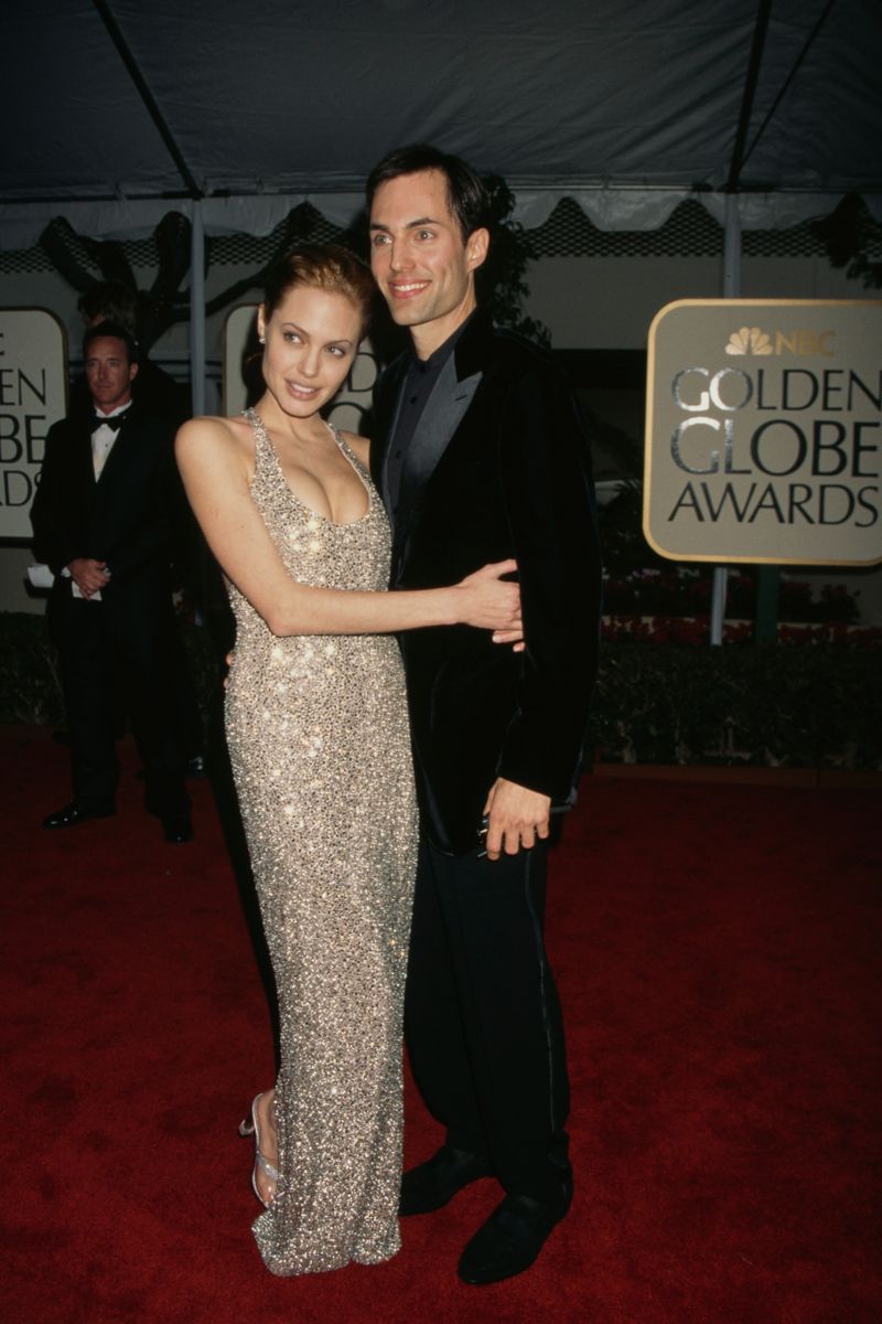 Angelina Jolie and James Haven during the 56th Annual Golden Globe 1999