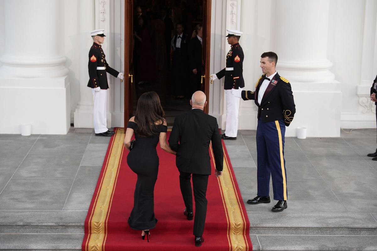 The couple made their way into the White House in coordinating black-tie looks, with Lauren completing her ensemble with towering black heels.