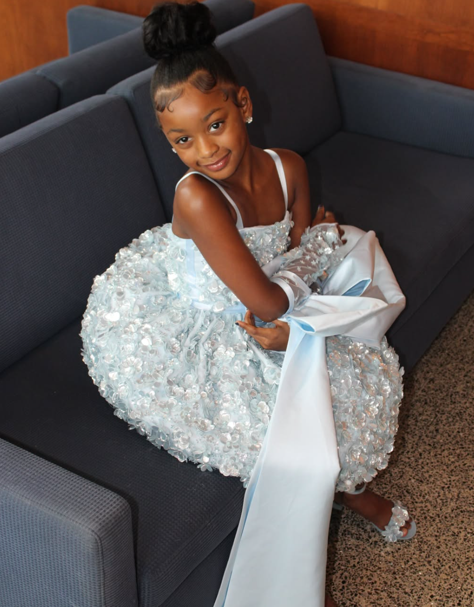 Cardi B celebrated daughter Kulture's 8th birthday with a private jet, Universal Orlando adventure, and extravagant Care Bears-themed cakes in a lavish family celebration