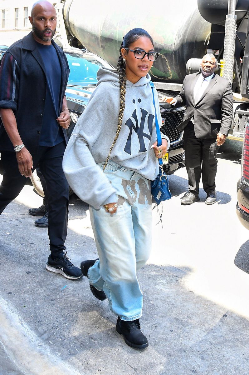 Blue Ivy Carter switches things up with a stunning waist-length ponytail braid while joining Jay-Z at a pop-up event