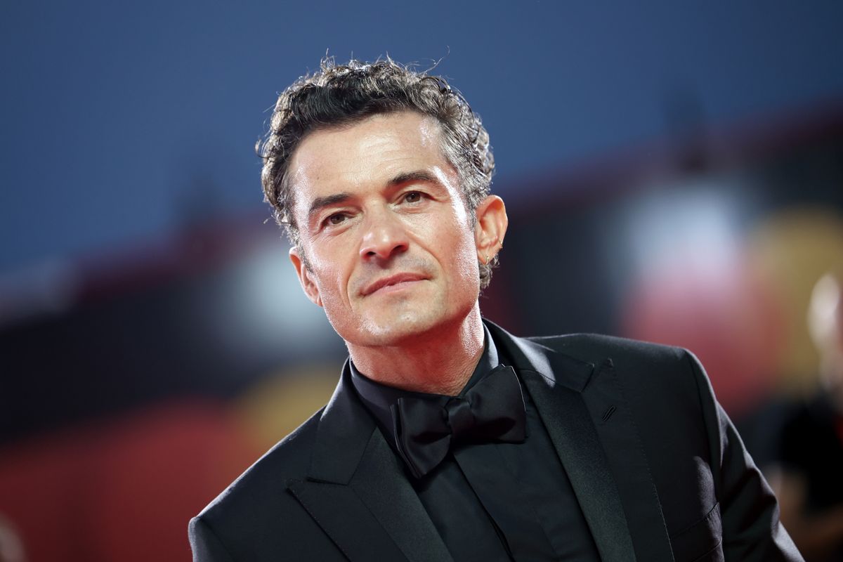 Orlando Bloom attends the "Filming Italy Venice Award" red carpet during the 83rd Venice International Film Festival