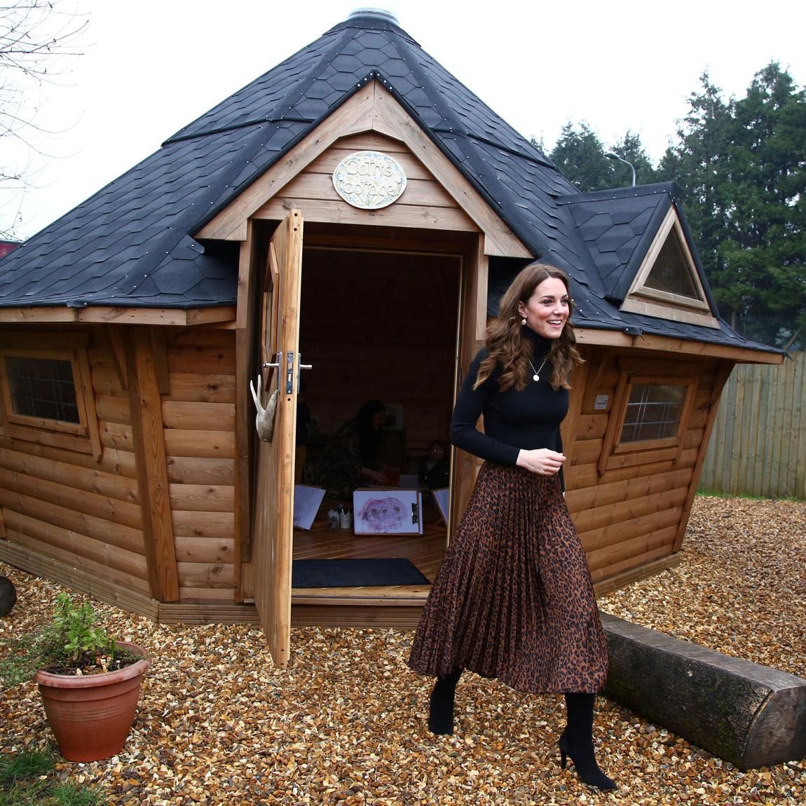 The Duchess looked stylish in a turtleneck and Zara skirt