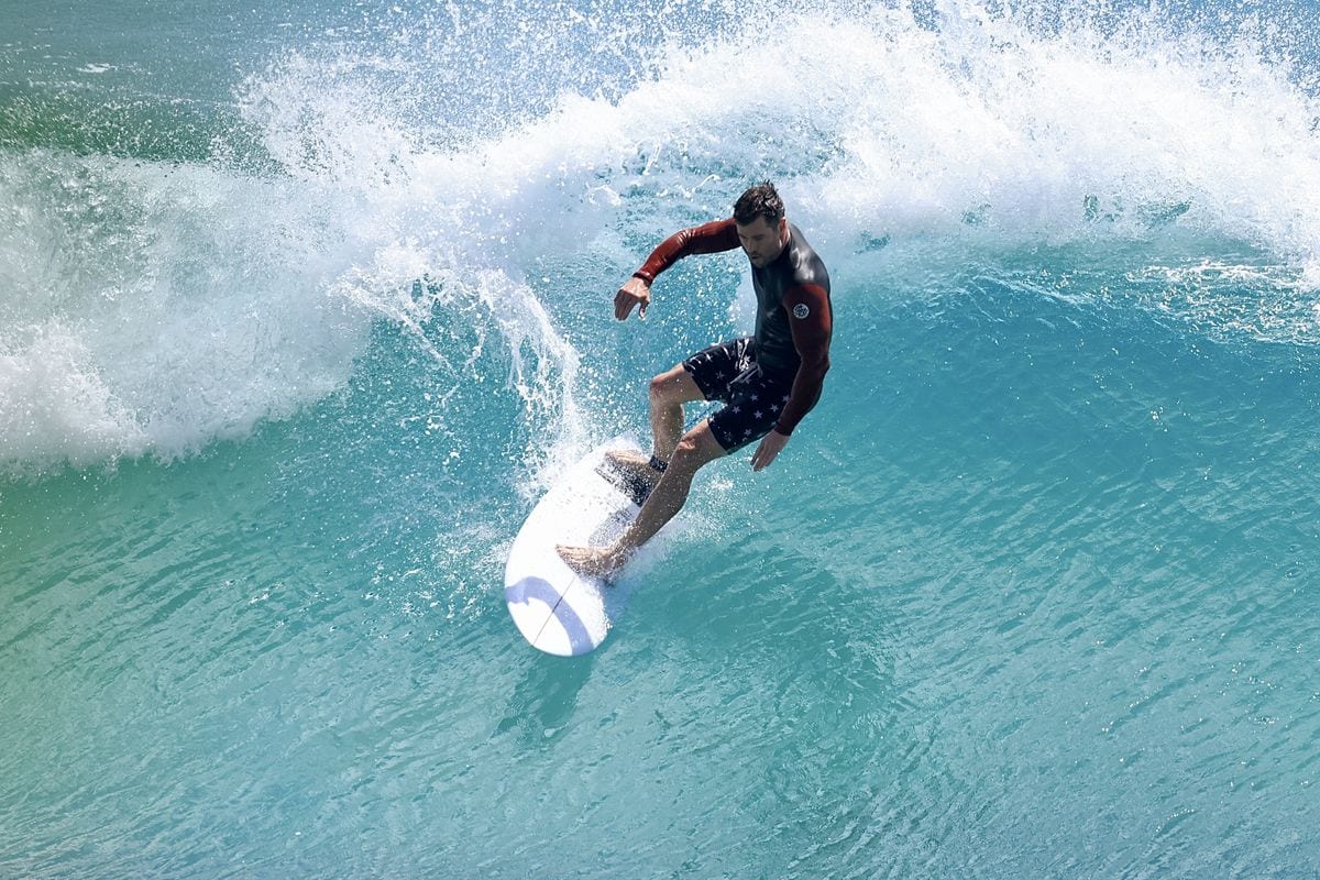Chris Hemsworth was spotted catching waves in his hometown of Byron Bay. 