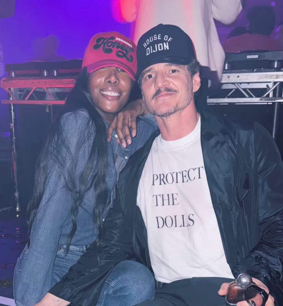 Pedro Pascal wearing a ‘Protect the Dolls’ T-Shirt at his 50th birthday party, alongside Honey Dijon.