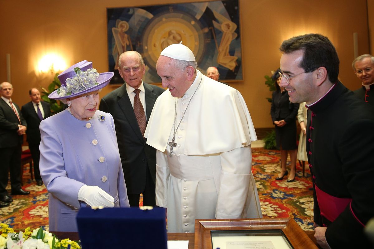 VATICAN CITY, ITALY - APRIL 03:  Queen Elizabeth II and Prince Philip, Duke of Edinburgh, have an audience with Pope Francis, during their one-day visit to Rome on April 3, 2014 in Vatican City, Vatican. During their brief visit The Queen and the Duke of Edinburgh will have lunch with Italian President Giorgio Napolitano and an audience with Pope Francis at the Vatican. The Queen was originally due to travel to Rome in April 2013 but the visit was postponed due to her ill health. The audience with Pope Francis will be the fifth meeting The Queen, who is head of the Church of the England, has held with a Pope in the Vatican.  (Photo by Oli Scarff/Getty Images)