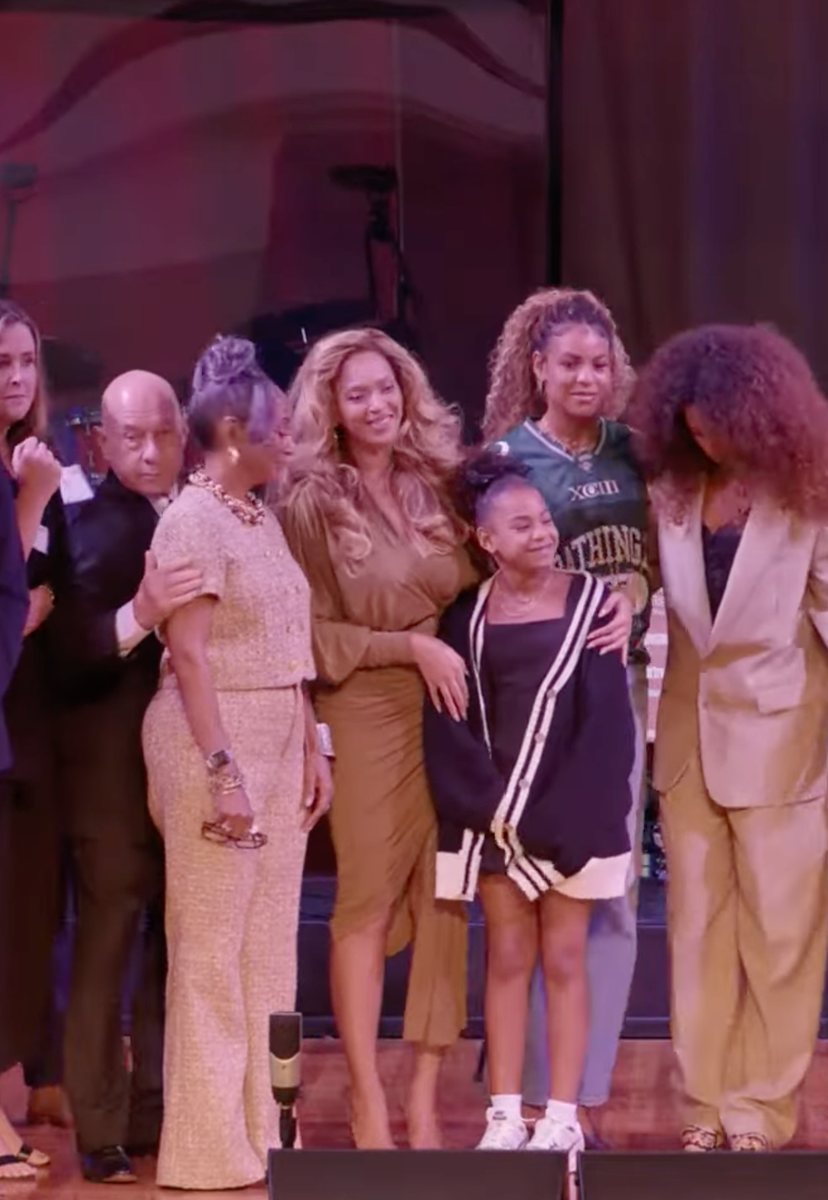The sisters stood alongside their mother as the family celebrated the opening of the Knowles-Rowland House at St. John's Downtown Church.