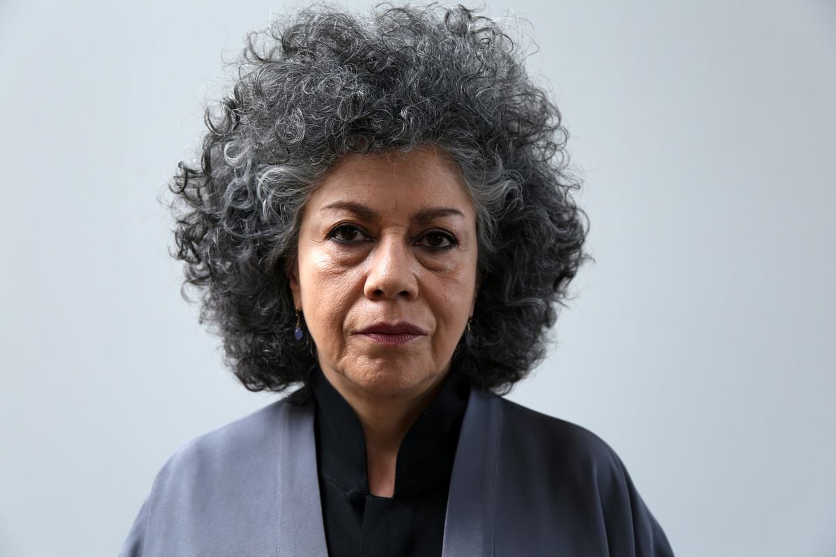 Colombian artist Doris Salcedo makes a statement about her artwork entitled "Fragmentos" during the inauguration ceremony of her work in Bogota, Colombia, on December 10, 2018. The work "Fragmentos" is part of the monuments, made from the guns handed over by former Revolutionary Armed Forces of Colombia (FARC) members as part of the peace agreements. 