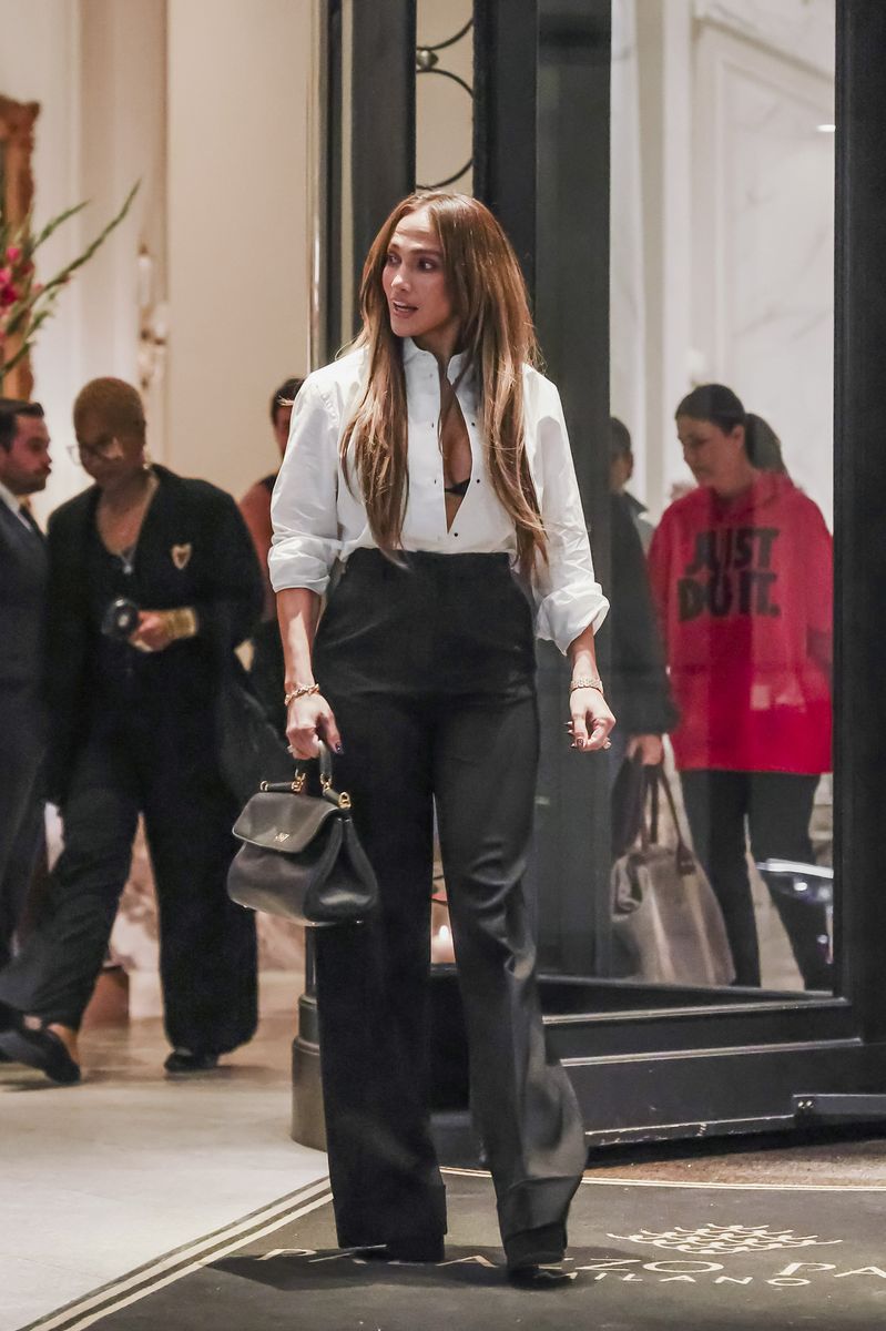 She completes the look with a small black Dolce & Gabbana bag.