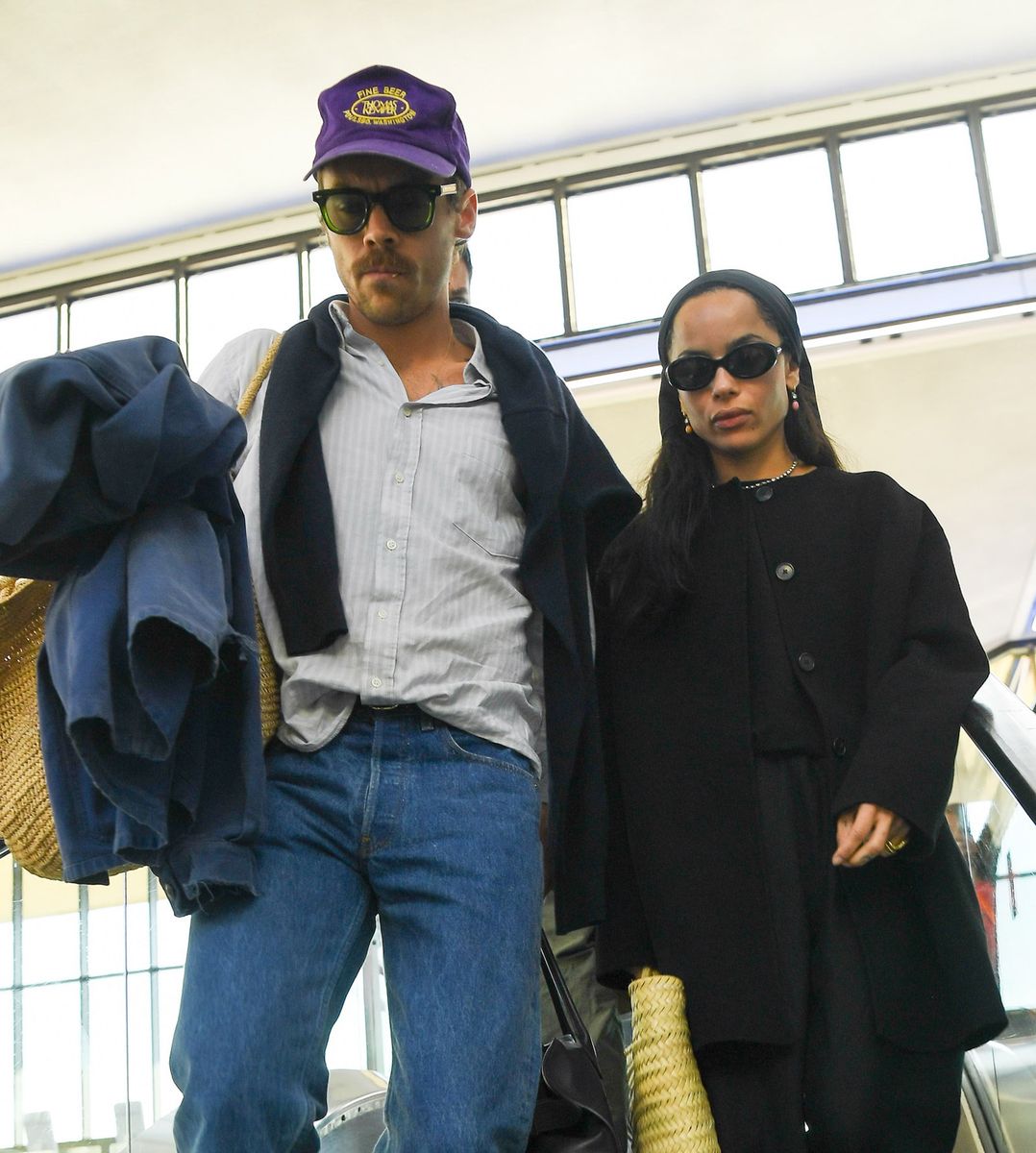 Harry Styles and Zoe Kravitz are spotted catching a flight together out of New York at JFK Airport. 