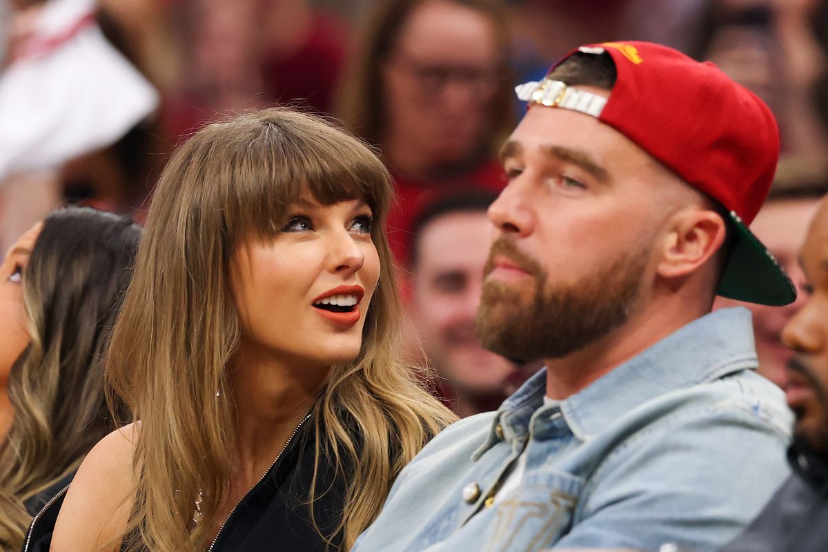 Taylor Swift and Travis Kelce of the Kansas City Chiefs attend Game Three between the New York Knicks and the Cleveland Cavaliers