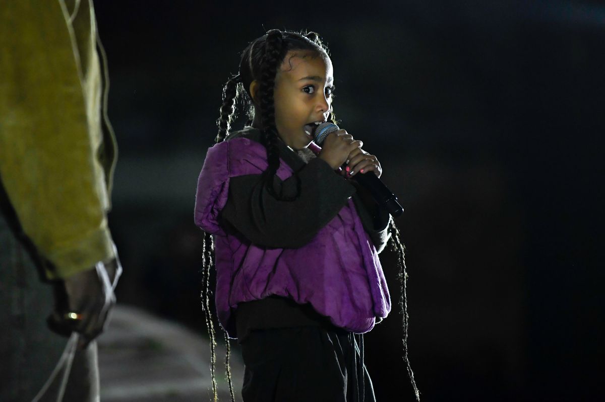Kanye West and North West on the catwalk (Photo by WWD/Penske Media via Getty Images) 