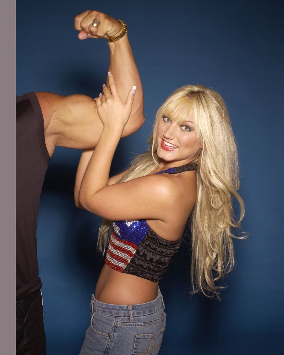  Singer and reality TV star Brooke Hogan poses for a portrait with her father Hulk Hogan on September 26, 2004 in Los Angeles, California. (Photo by Harry Langdon/Getty Images)