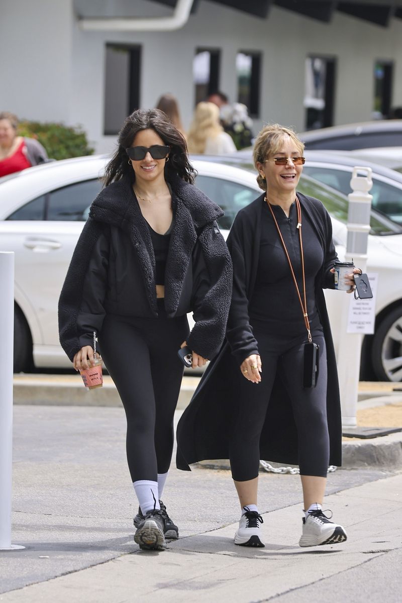Camila Cabello was seen enjoying a relaxed coffee outing with her mother at Alfred's in Los Angeles. 