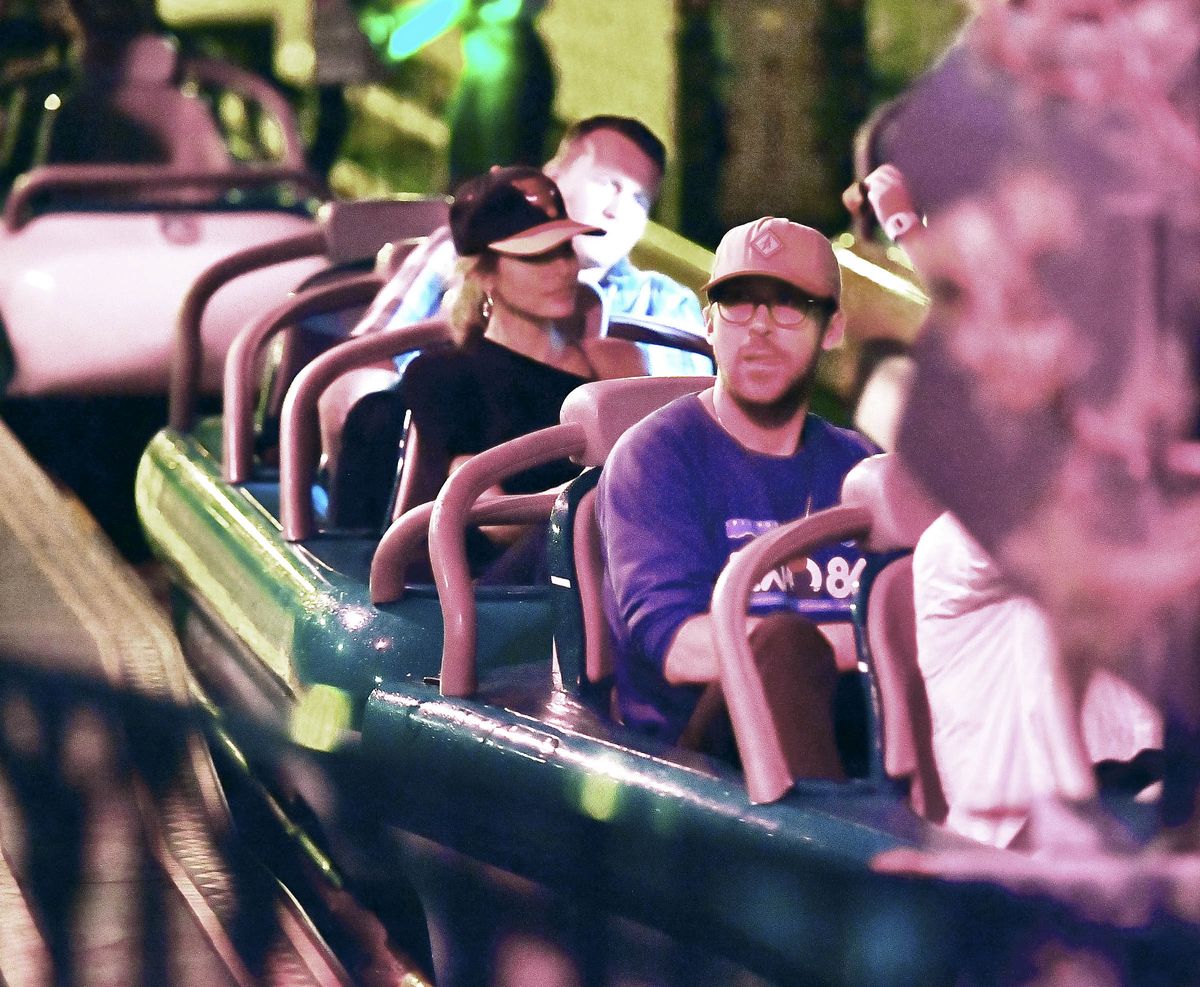 Ryan Gosling and Eva Mendes with their kids at Disneyland