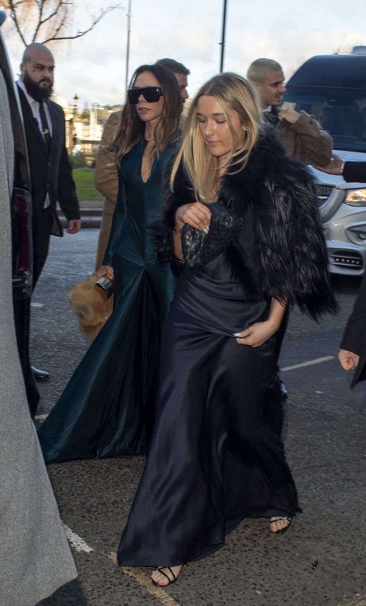 Harper first wore this midnight-blue satin gown with delicate straps at her father’s 50th birthday celebrations in July 