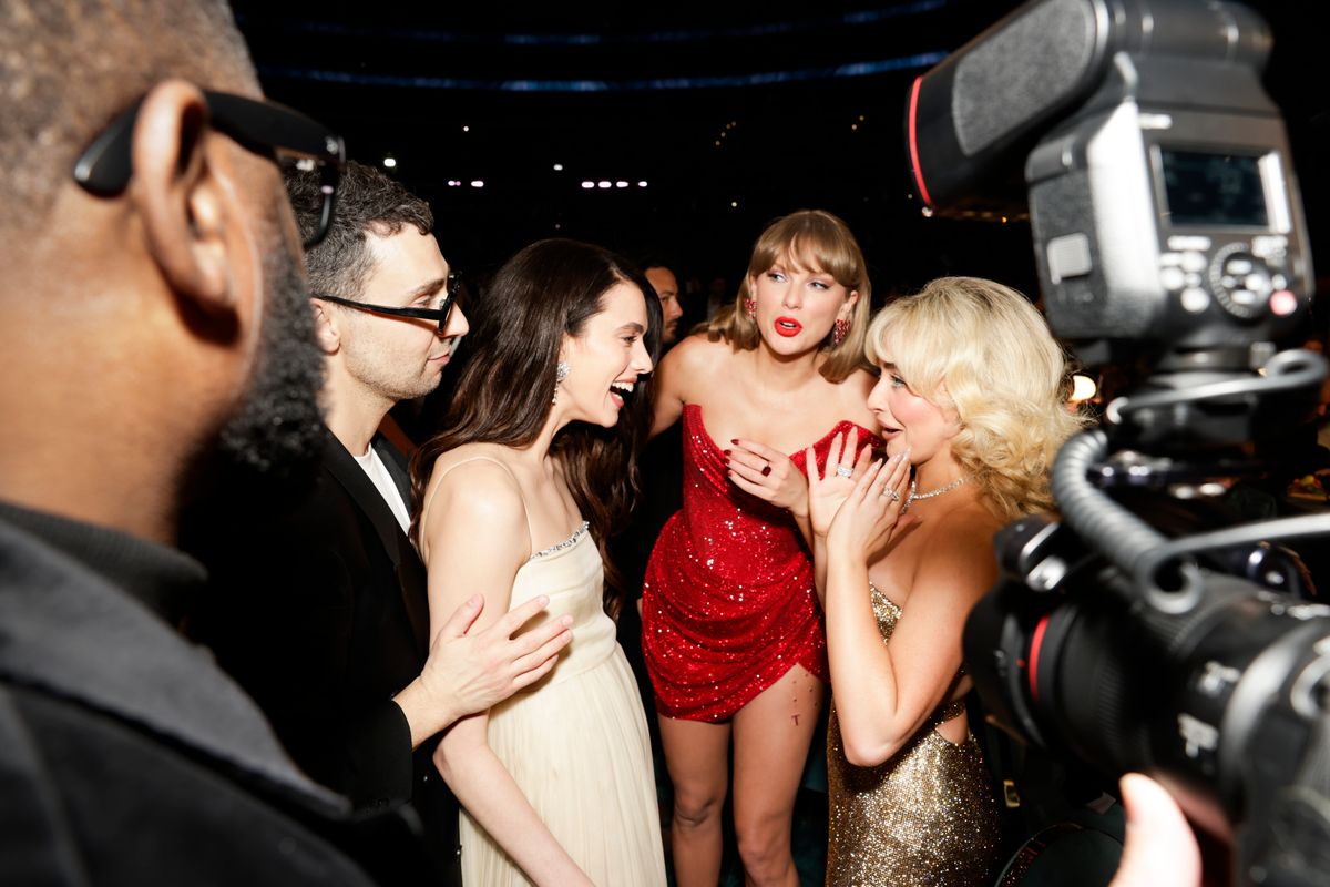 Jack Antonoff attended Taylor Swift and Travis Kelce's wedding without Margaret Qualley, fueling speculation about their relationship.