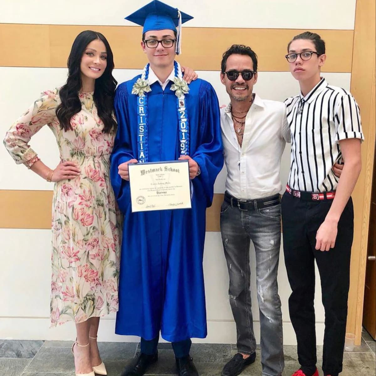 Dayanara Torres and Marc Anthony with their sons Cristian and Ryan.