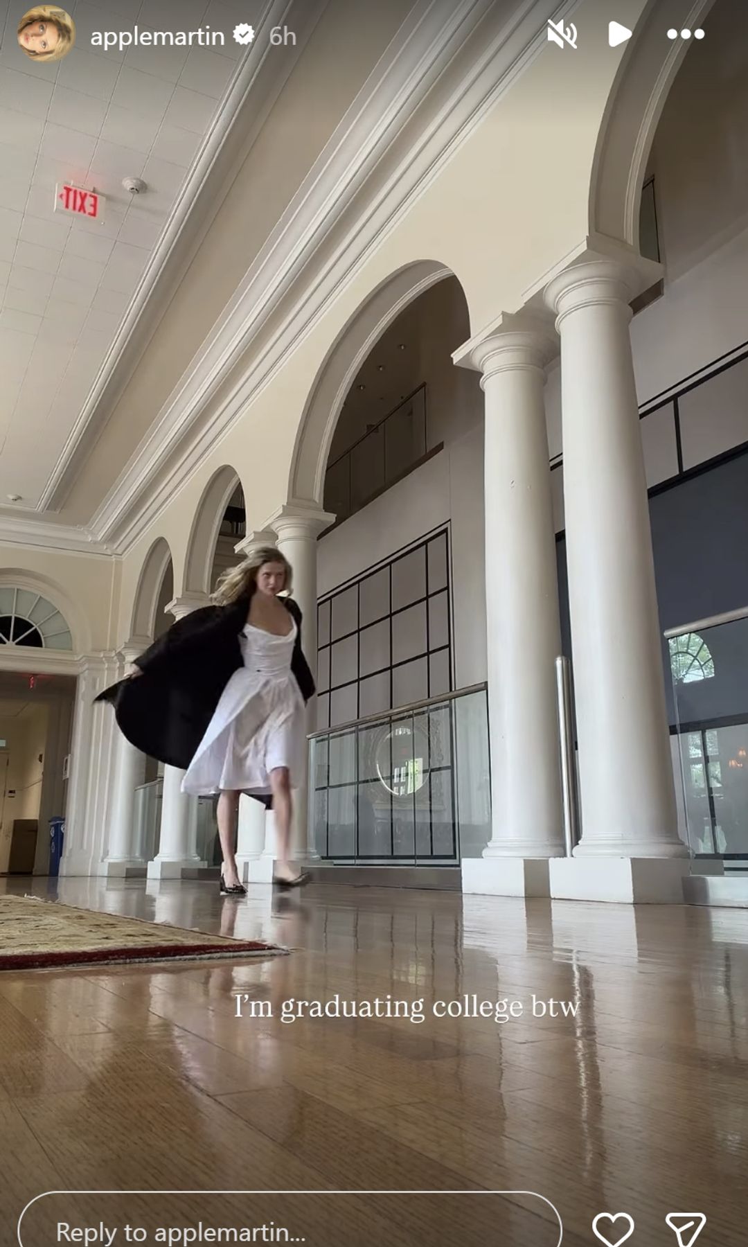 Apple is practicing her graduation catwalk