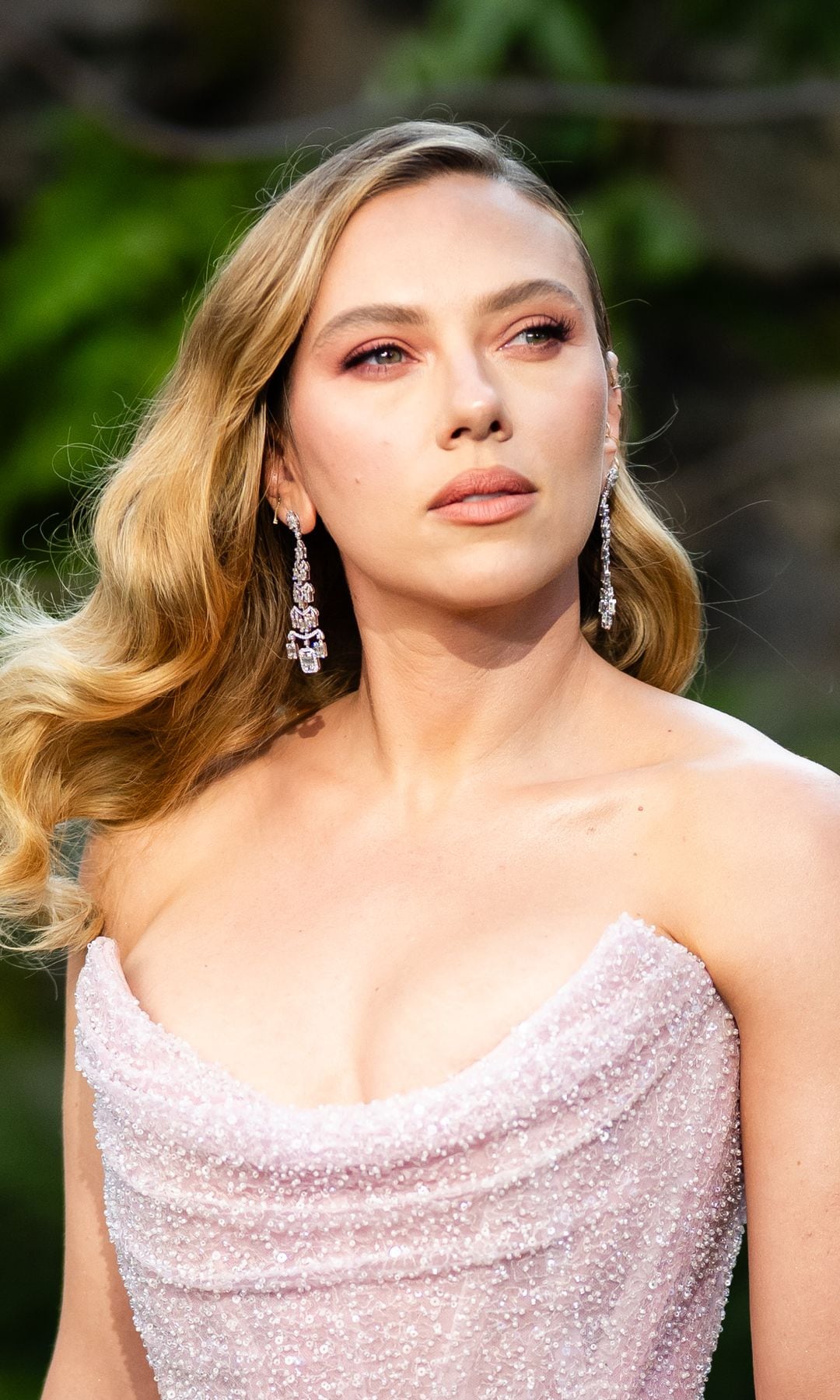 Scarlett Johansson poses in figure-hugging red dress and diamond choker in Shanghai: Her latest fashion moments