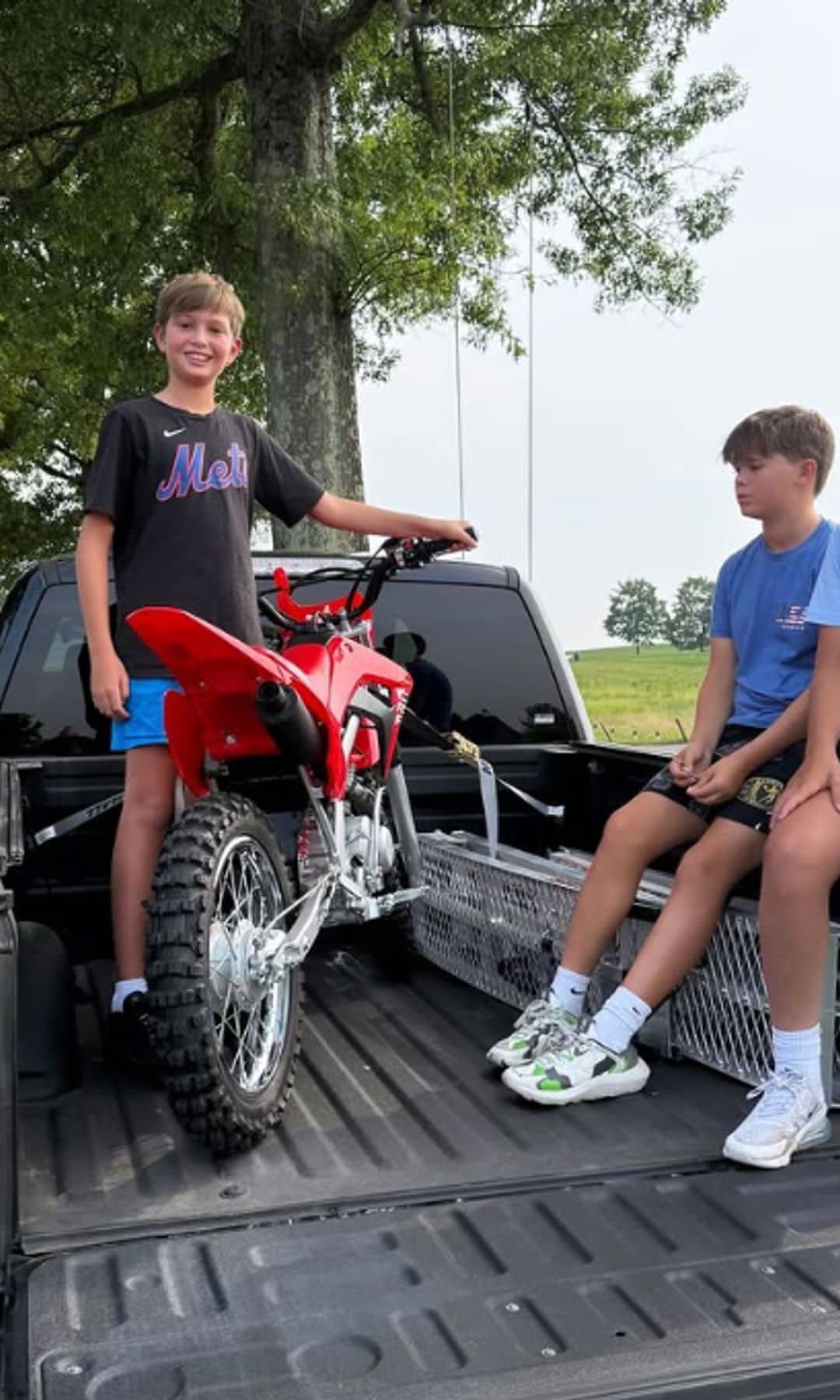 Joseph was accompanied by his friends as he picked up his first dirt bike