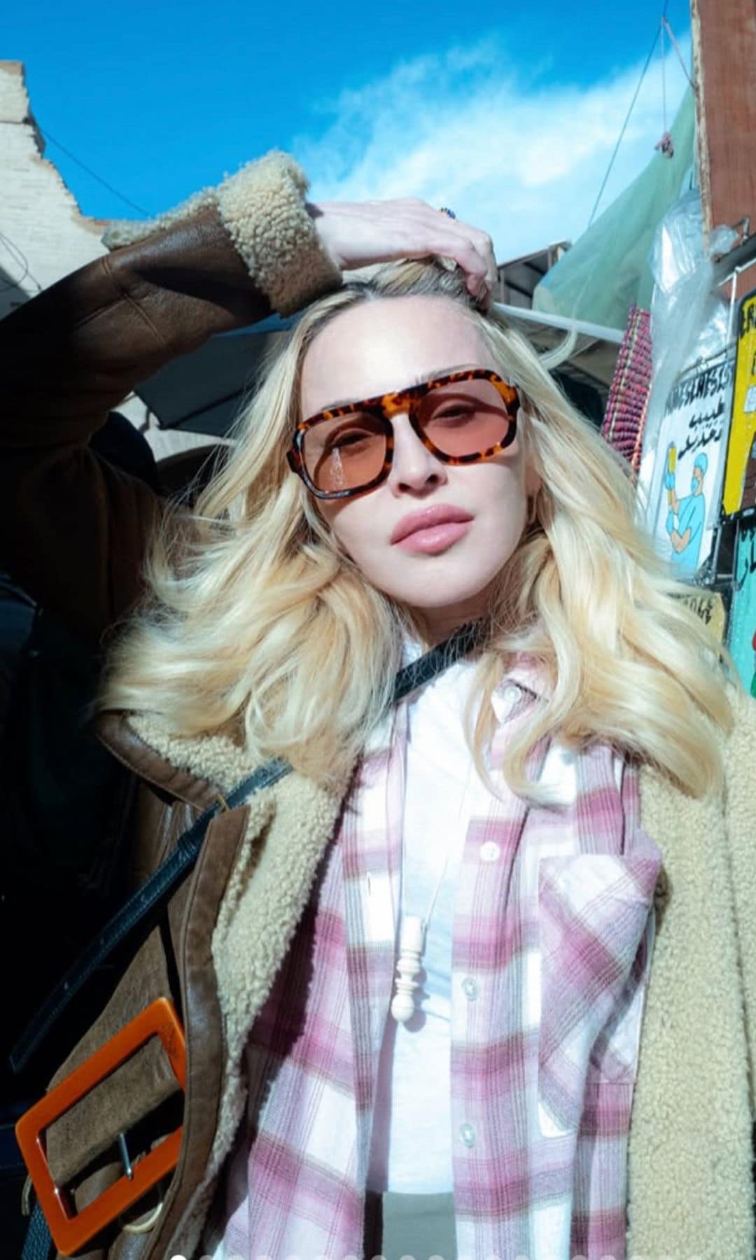 Madonna, 67, turns heads in lace lingerie, fishnet tights, and sheer opera gloves