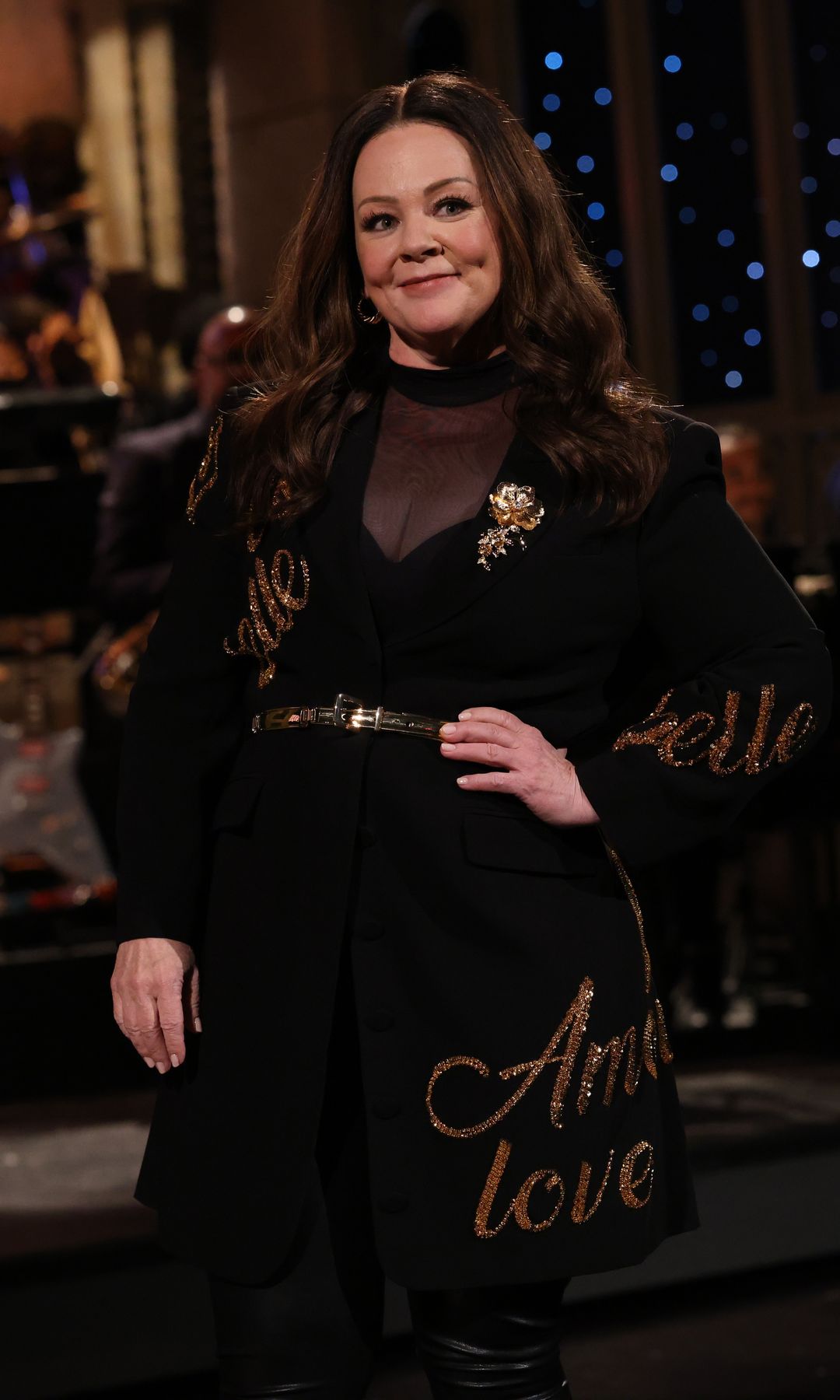 Host Melissa McCarthy introduces musical guest Dijon on Saturday, December 6, 2025 