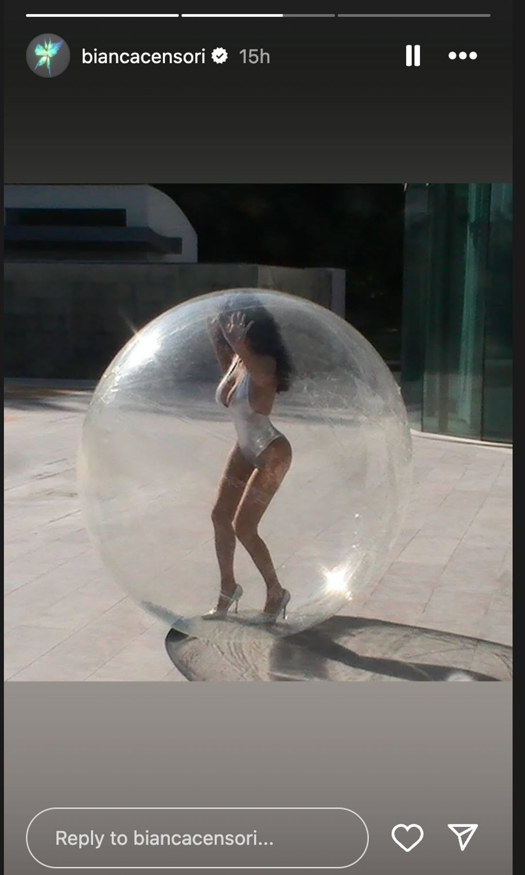 Censori wore a silver bodysuit, heels, and inside a transparent bubble
