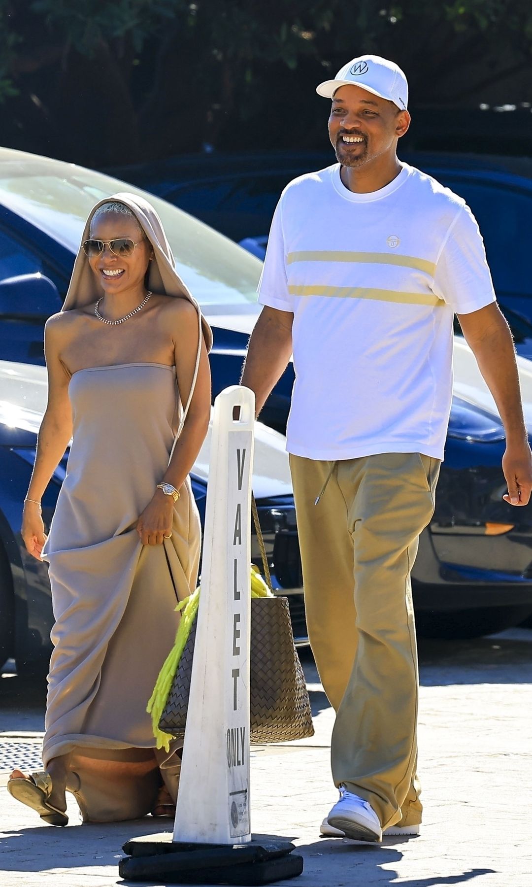 The pair wore complimenting outfits, with both opting for beige and nude colors