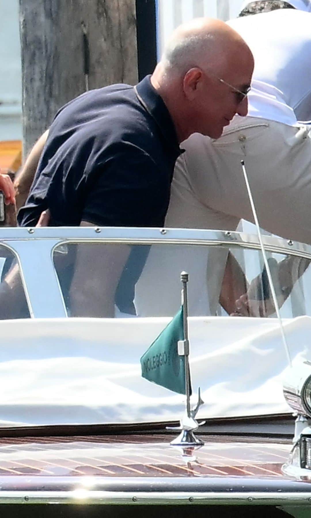Amazon's founder Jeff Bezos (C) arrives at the Aman Hotel in Venice