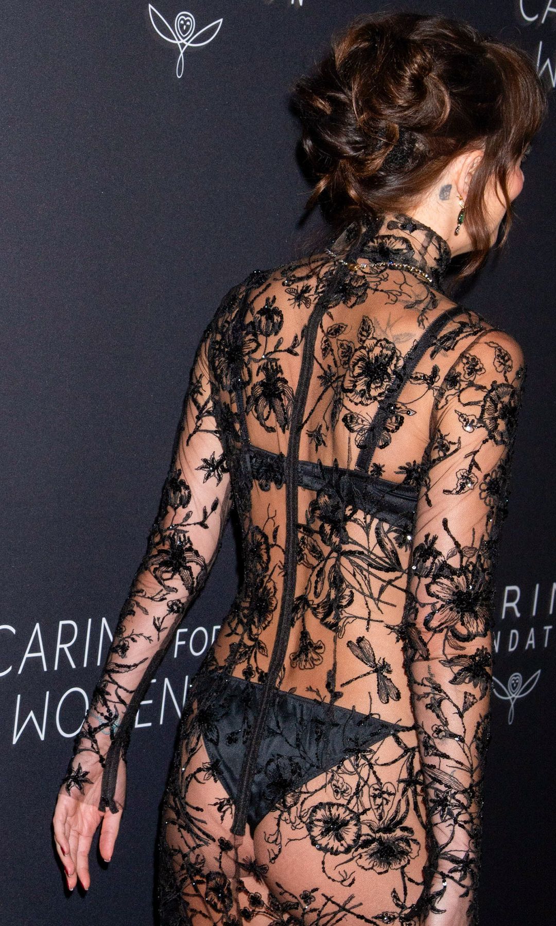 dakota johnson sheer dress Dakota Johnson Stuns in Slinky Metallic See-Through Halter Dress