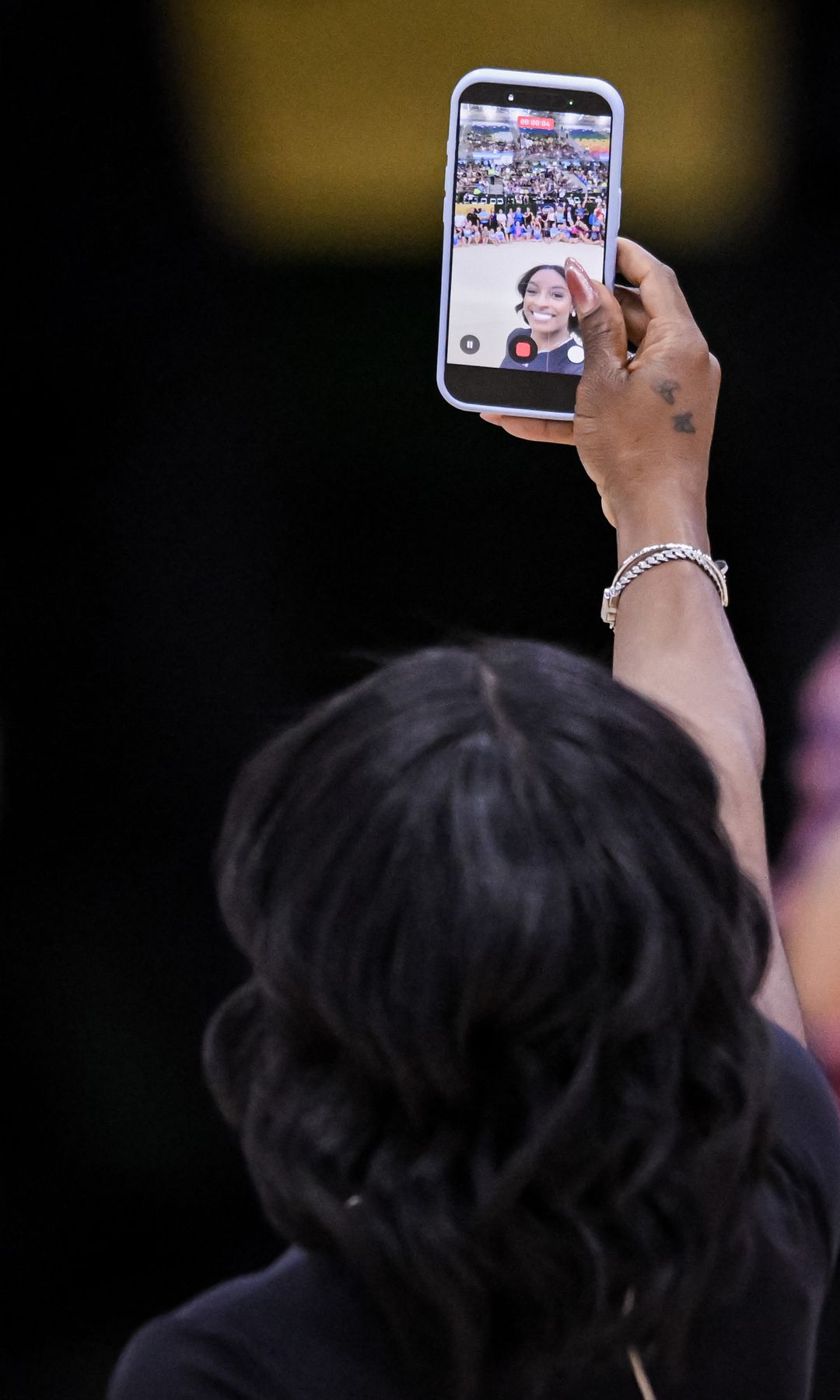 BUENOS AIRES, ARGENTINA - OCTOBER 9: Simone Biles records a 360Â° selfie video during her Gymnastics Clinic at Youth Olympic Park Villa Soldati on October 9, 2025 in Buenos Aires, Argentina. (Photo by Marcelo Endelli/Getty Images)
