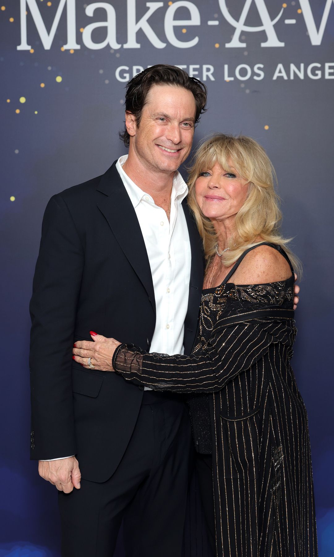 Oliver Hudson and Goldie Hawn at a Make-A-Wish event in 2025