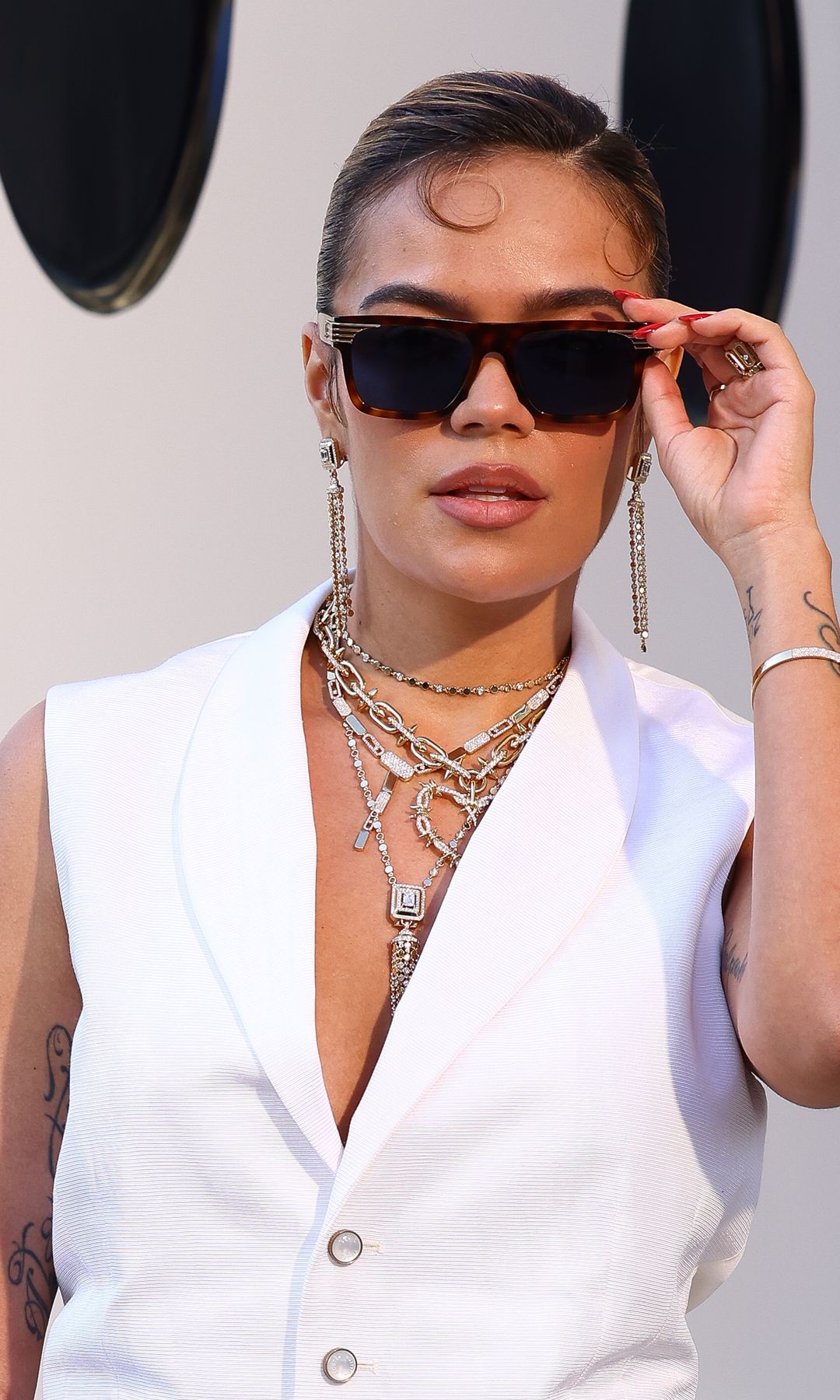 Karol G rocks the most high-fashion but wearable look at Louis Vuitton's SS26 Paris Show
