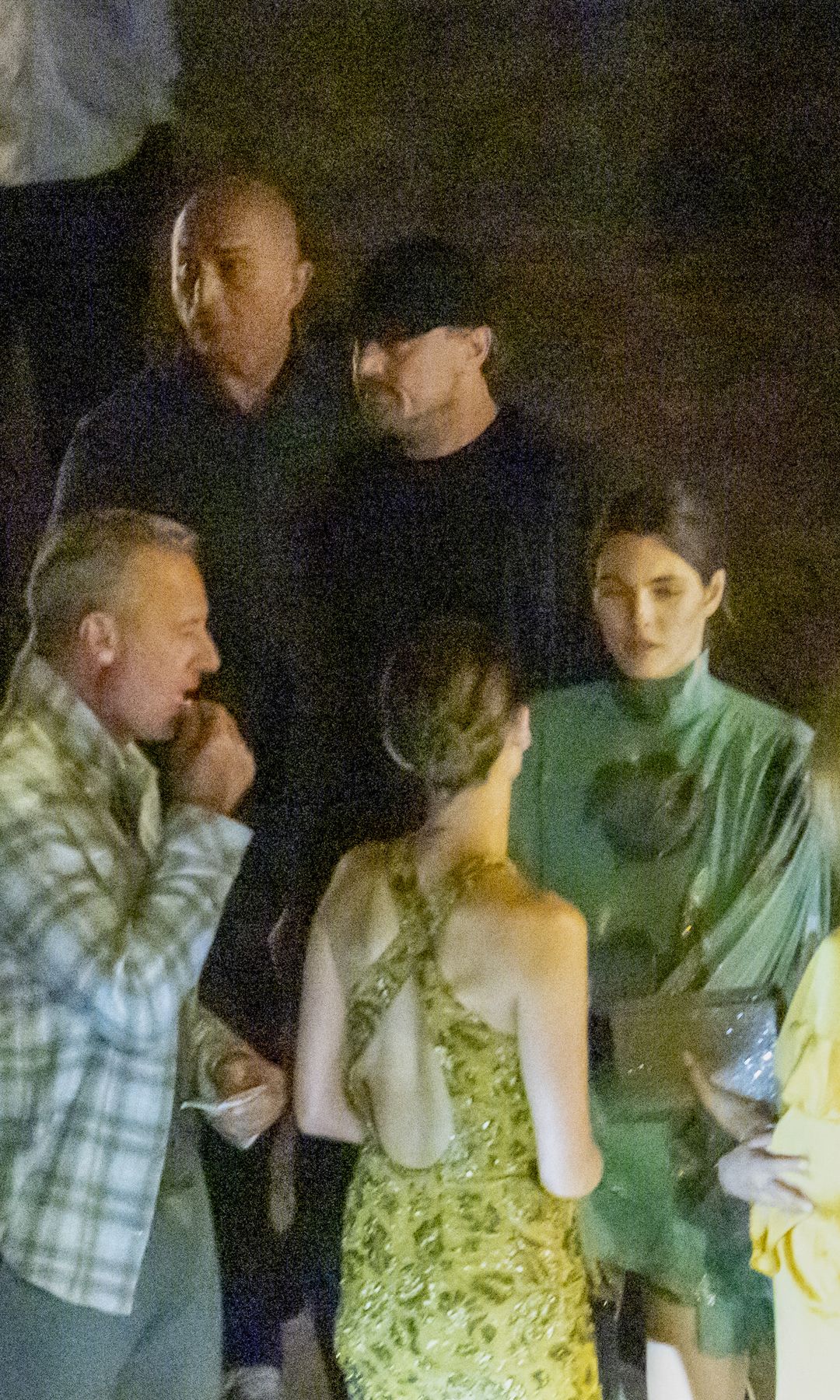 The two were photographed outside of the restaurant, catching up with some friends