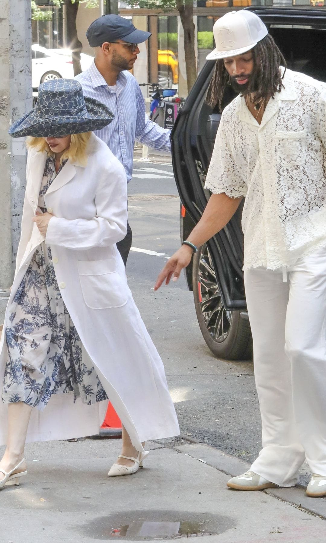 Madonna and Morris in New York, alongside her twin daughters