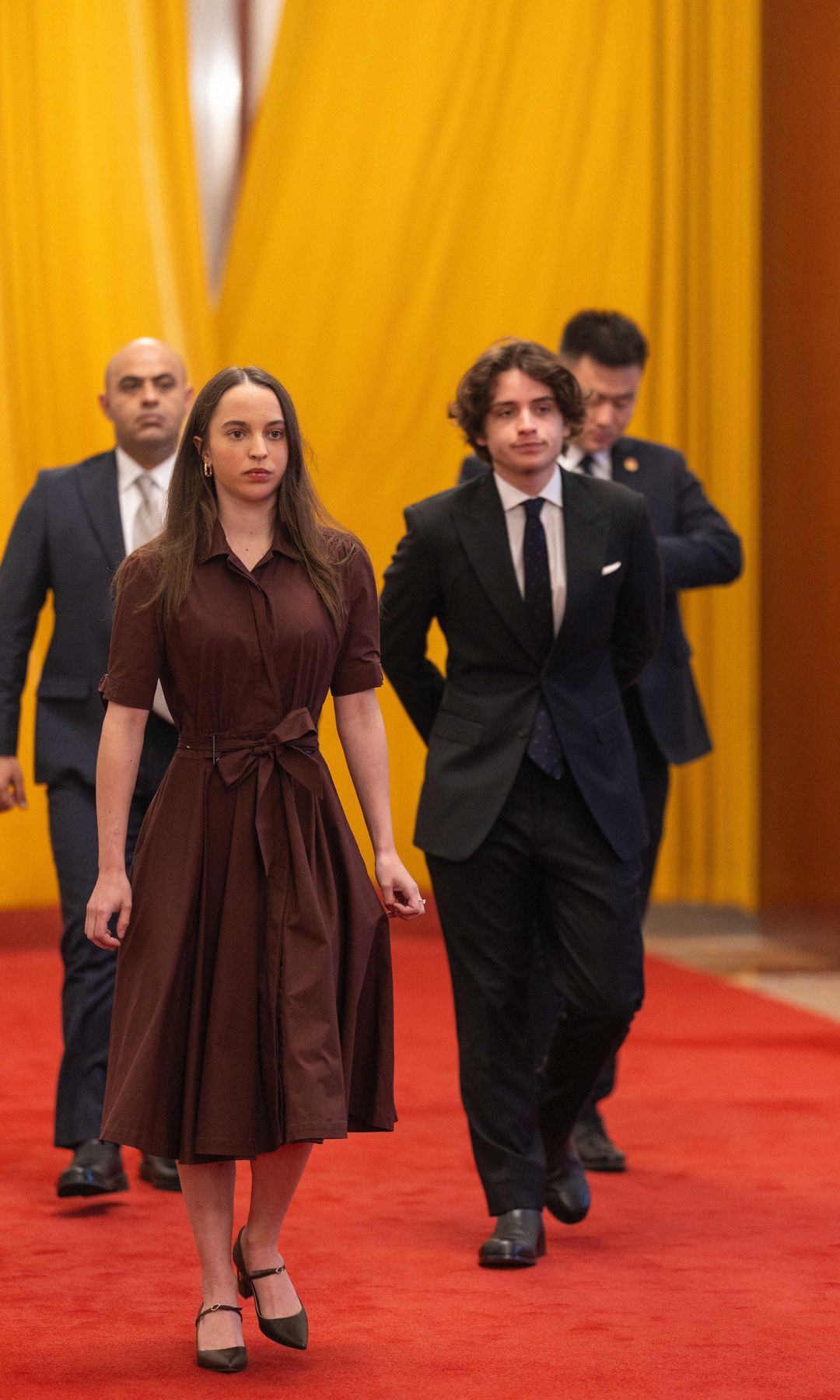 Princess Salma of Jordan stepped out in an elegant brown Bottega Veneta shirt dress during the royal visit to China.