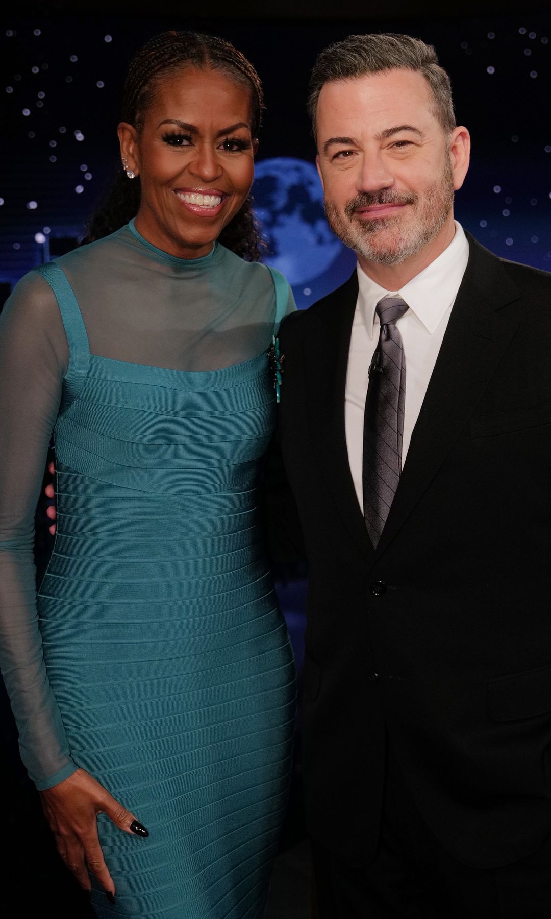 Michelle's dress stands out for its tight fit and lace details