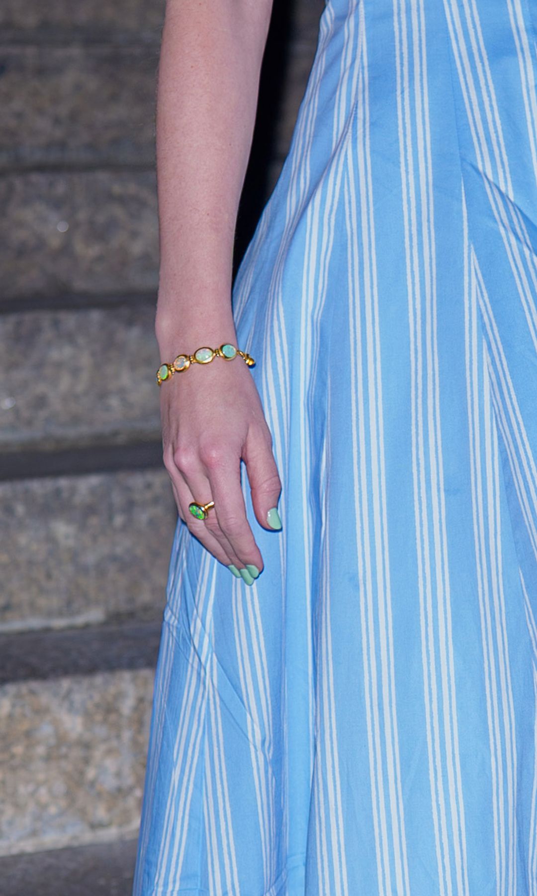 
Millennial mint is making a polished comeback, and Taylor Swift may have just delivered its chicest new evolution yet: opalite-inspired dressing.
