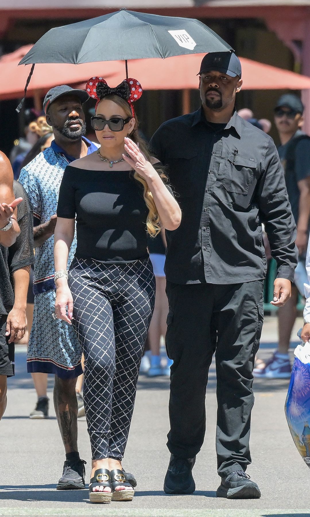 Carey dressed appropriately with Minnie ears