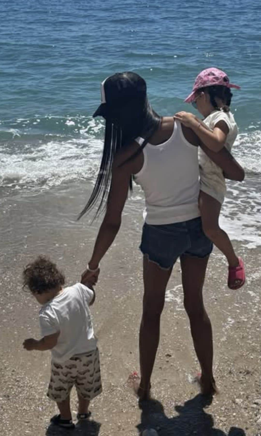 Campbell and her two kids made time to enjoy the beach in the summer