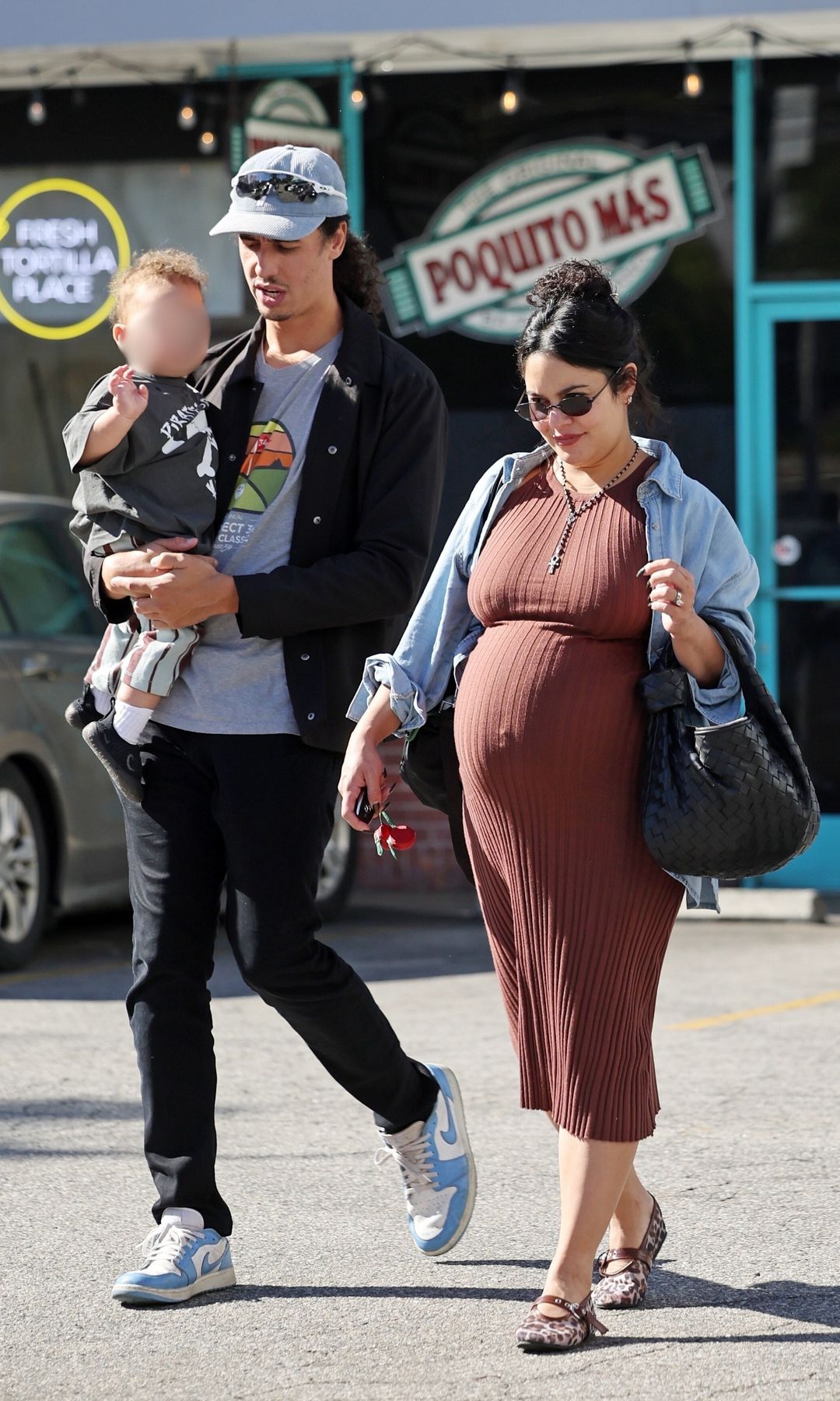 Tucker, Hudgens and their son were spotted grabbing some breakfast