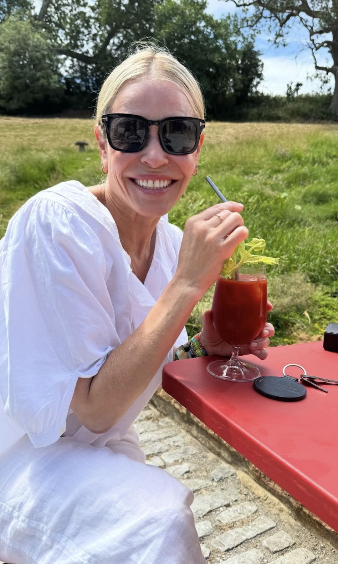 Chelsea Handler was featured in the post, enjoying a drink and the sun