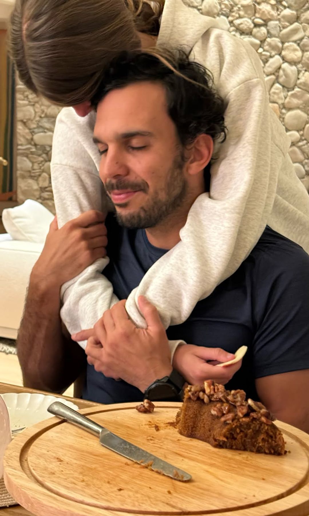 Valente and Vivian sharing a sweet hug