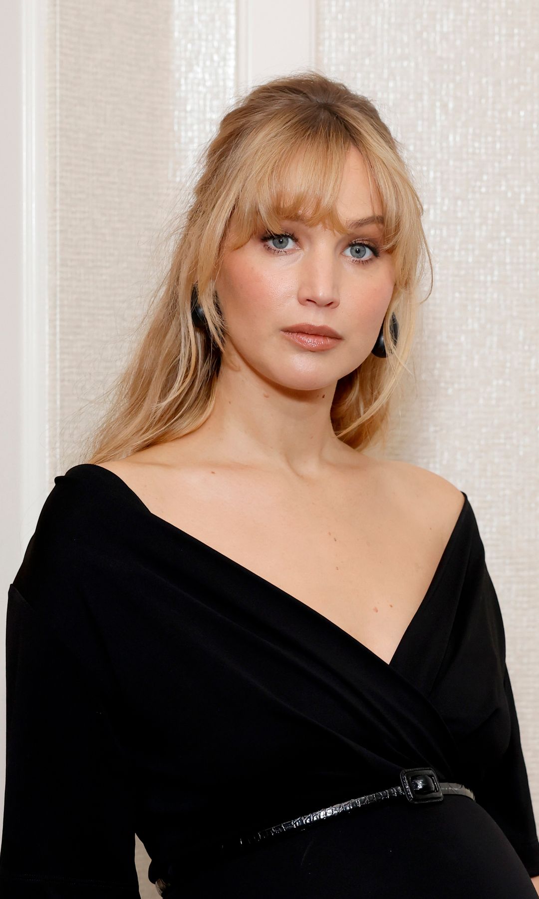 Jennifer Lawrence defies red carpet ‘dress code’ with architectural dress and sock-heels combo