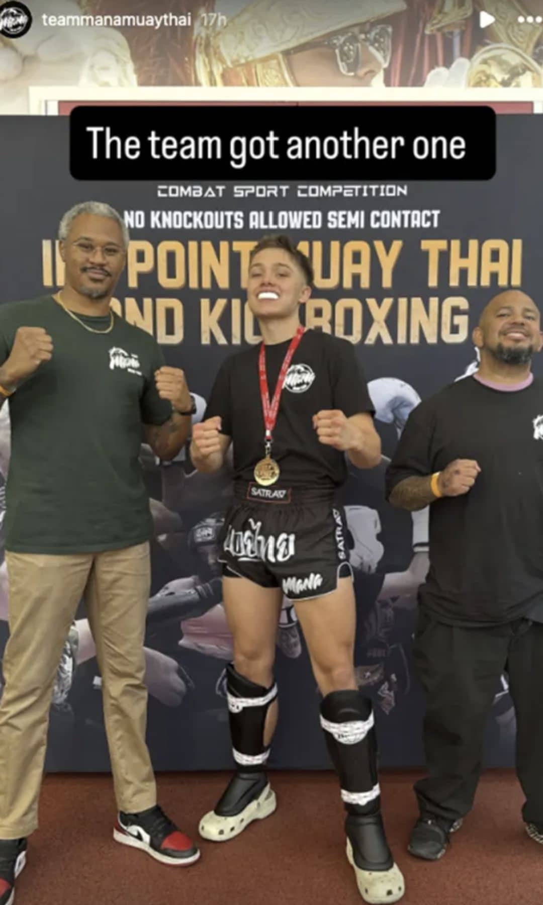 Knox ended up winning his match, proudly showing off his medal