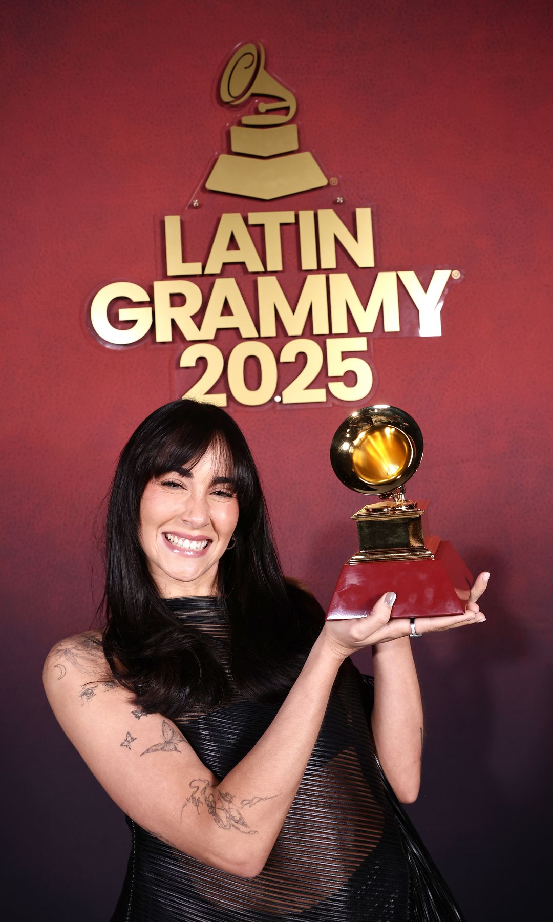Aitana wins her first Latin GRAMMY in a semi-sheer gothic mini-dress