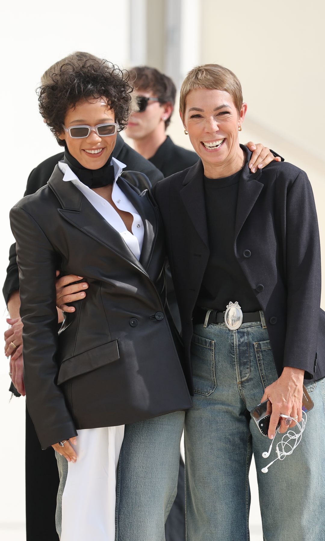 Mathilde Favier alongside actress Taylor Russell in Paris Fashion Week 2025