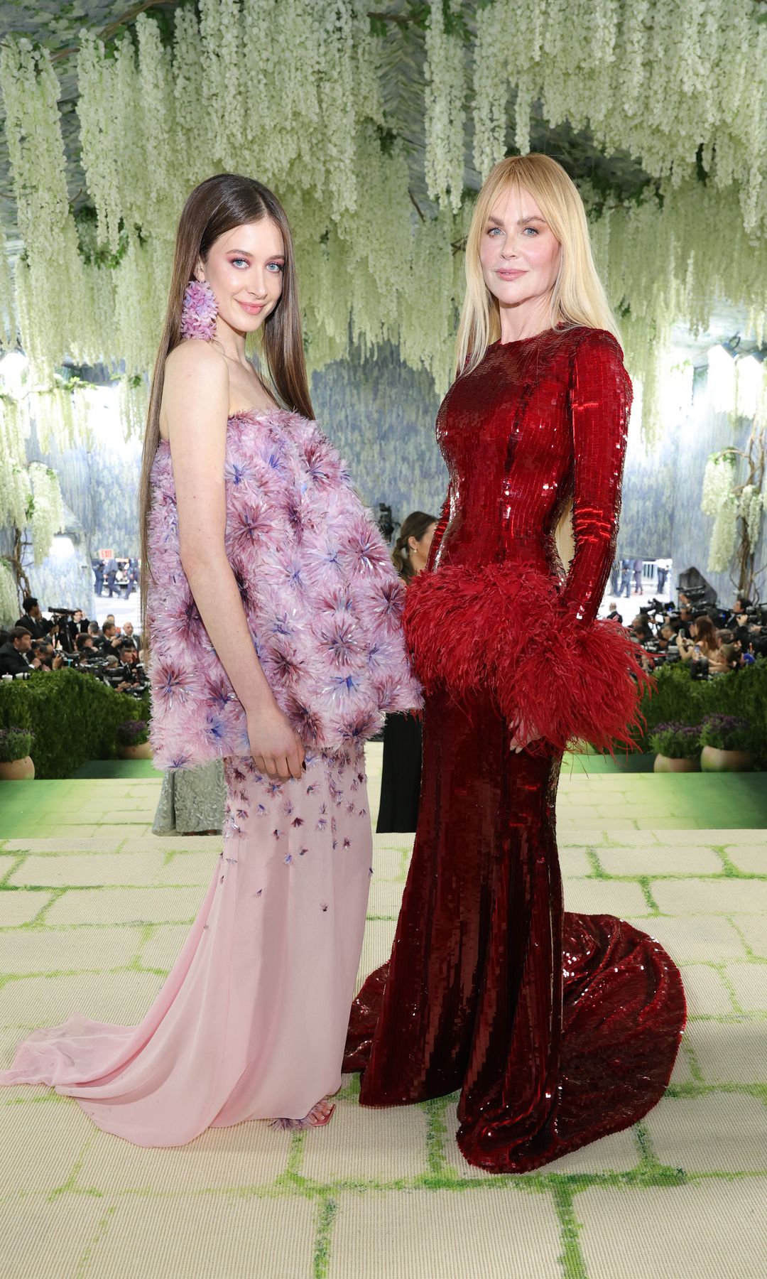 The pair wore pink and red for their joint appearance