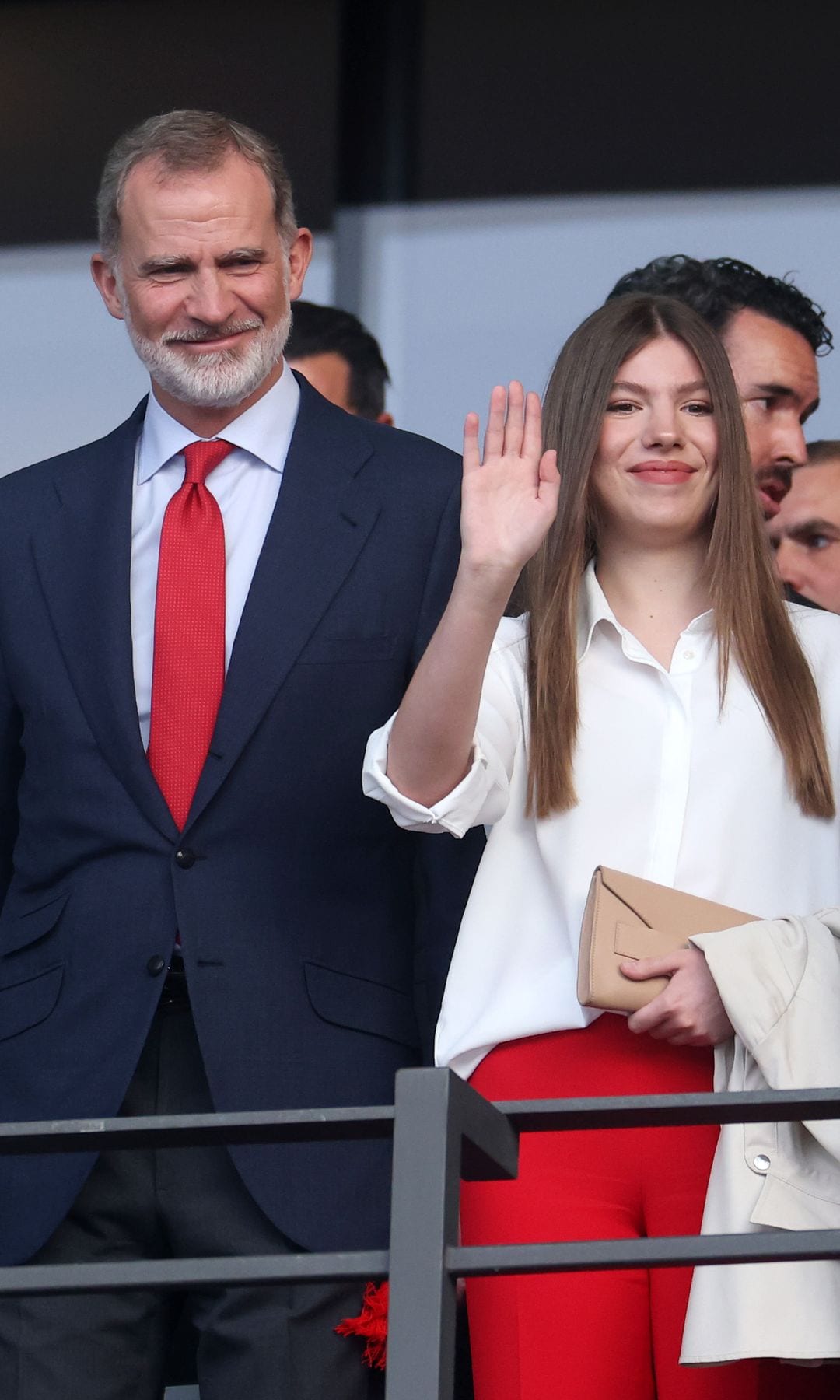 BERLIN, GERMANY - JULY 14: Felipe VI, King of Spain, and Princess Sofia of Spain acknowledge the fans as Pedro Rocha, President of the Royal Spanish Football Federation, looks on prior to the UEFA EURO 2024 final match between Spain and England at Olympiastadion on July 14, 2024 in Berlin, Germany. (Photo by Lars Baron/Getty Images)