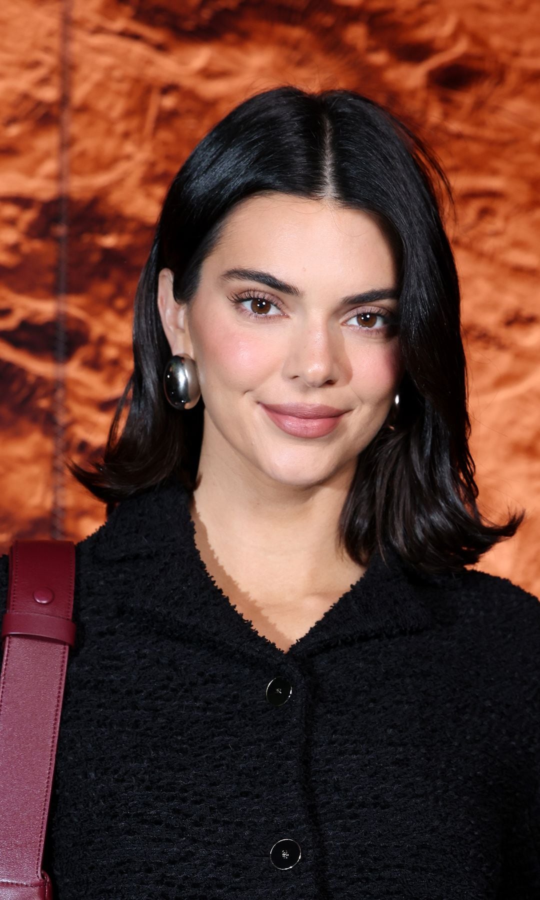 Kendall Jenner sunbathes in high-cut swimsuit and stuns in sleek cutout dress in Super Bowl ad